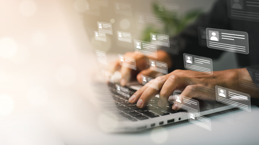 Typing on a laptop